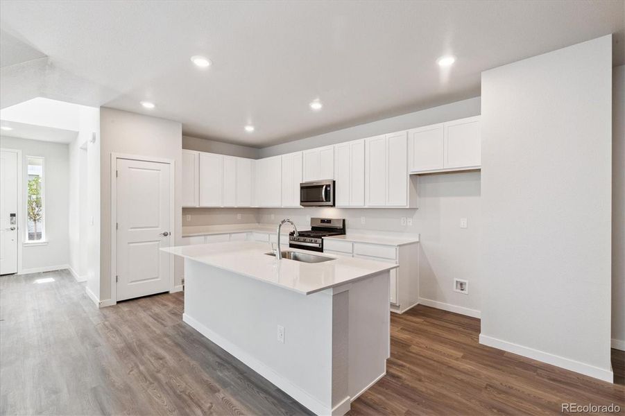Furnished interior view inside a new home in Paired Homes at Alder Creek, Parker (Image 9).