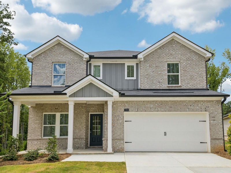 Representative exterior photo of a completed home built from the Johnson by Meritage Homes in Westmont Preserve, Powder Springs, GA (Image 1).
