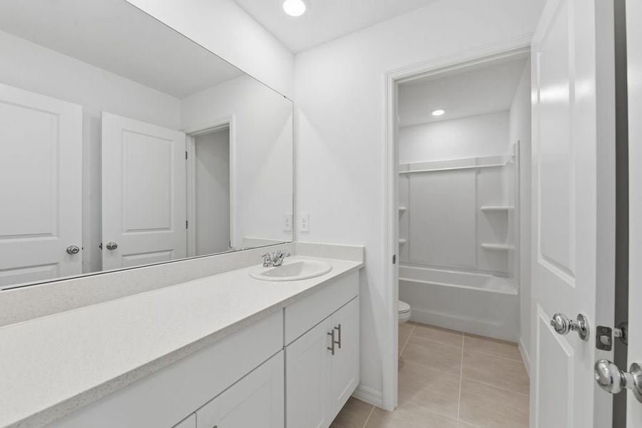 Representative furnished interior of a home built from the Redbud by Taylor Morrison in Firethorn, Parrish (Image 11).