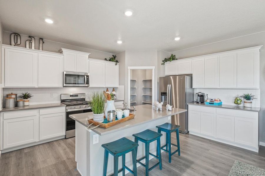 Furnished interior view inside a new home in Trails at Crowfoot, Parker (Image 6).