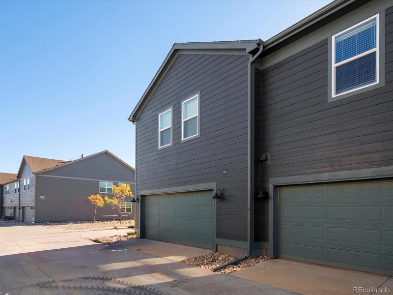 Exterior details and patio area of a home in Poudre Heights: The Meadow Collection, Windsor (Image 2).