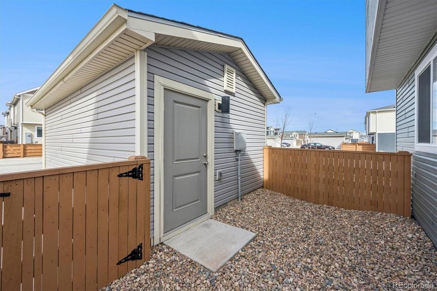 Exterior details and patio area of a home in Reunion, Commerce City (Image 4).