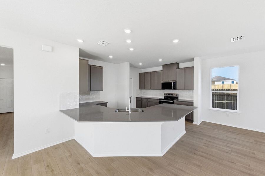 Furnished interior view inside a new home in Stoney Chase, Del Valle (Image 10).