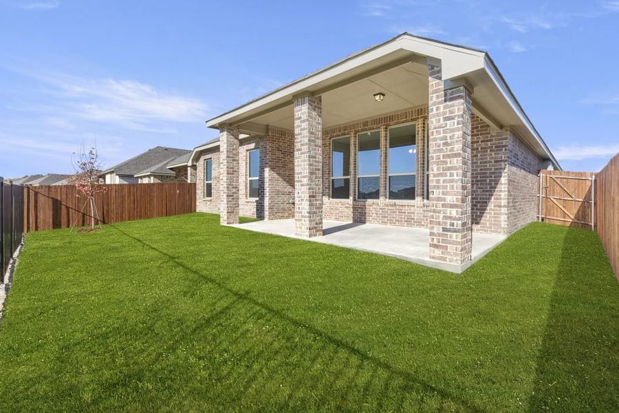 Representative exterior photo of a completed home built from the Kingston by Impression Homes in Arcadia Trails, Balch Springs, TX (Image 6).