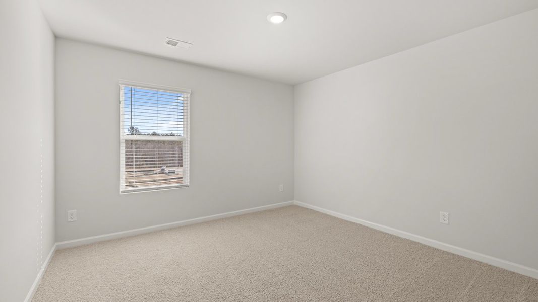 Representative unfurnished interior of a home built from the Halton by D.R. Horton in Southwind Village, Evans (Image 26).