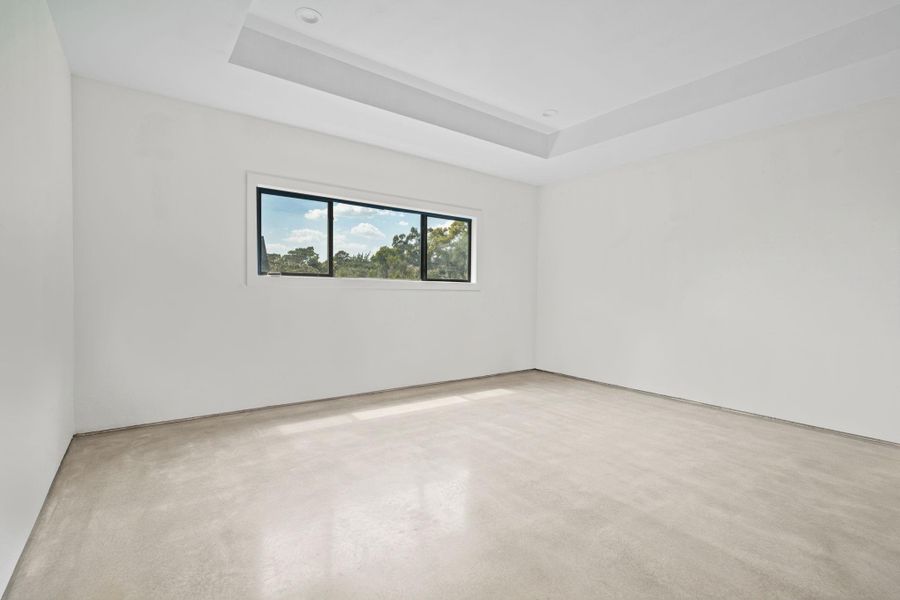 Step into a light filled bedroom where elegance meets everyday comfort. This exceptionally spacious bedroom is bathed in natural light thanks to large windows that amplify the airy open ambiance.