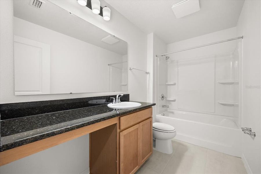 Furnished interior view inside a new home in Hickory Ranch, Auburndale (Image 6).