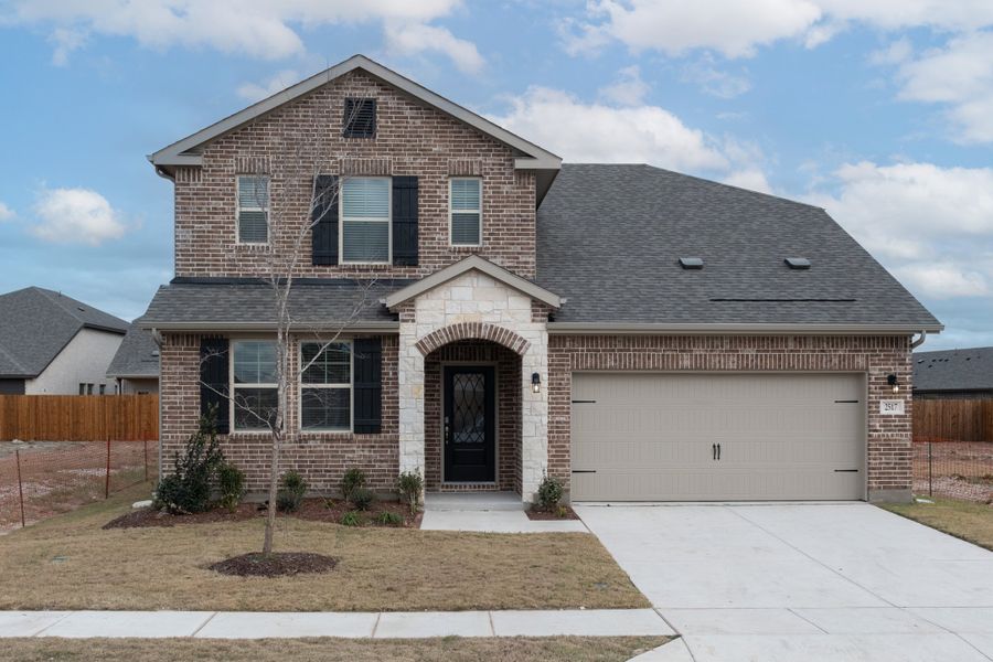 Front exterior of a new home in Churchill, Anna, TX, highlighting curb appeal (Image 1). Front exterior of a new home in Churchill, Anna, TX, highlighting curb appeal (Image 1).