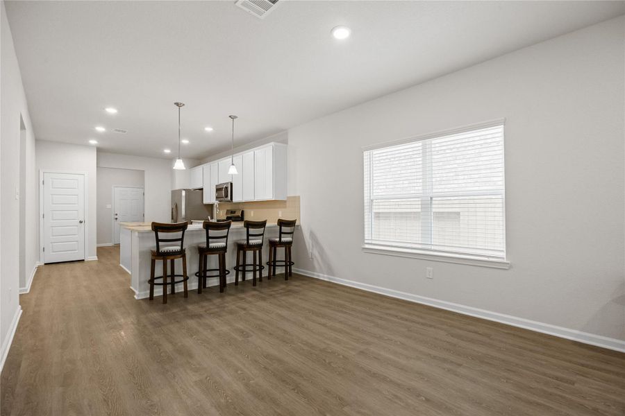 Furnished interior view inside a new home in Mill Creek Trails, Magnolia (Image 9).