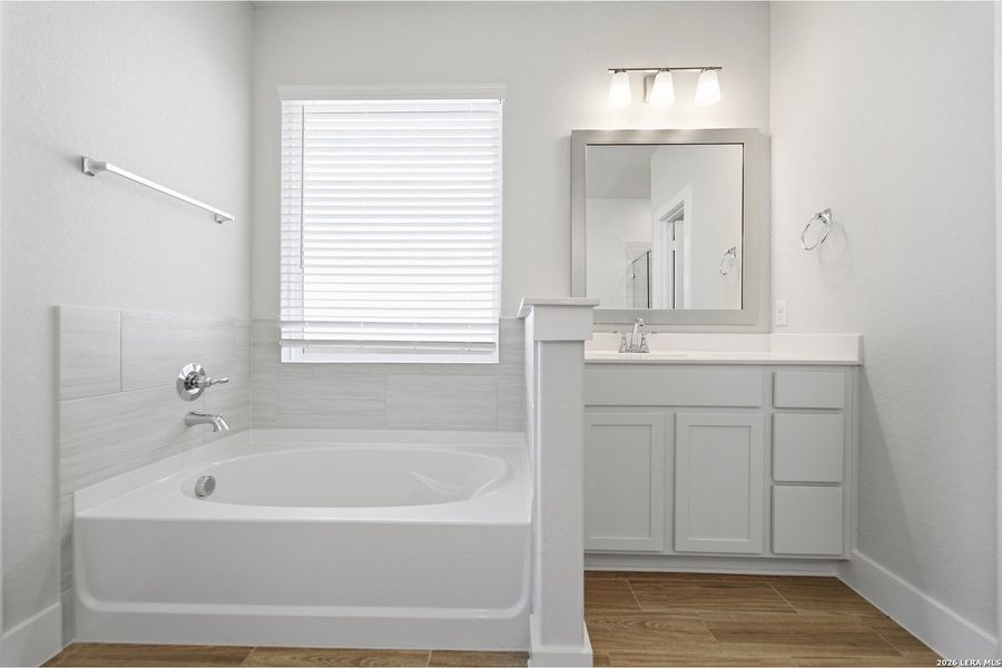 Furnished interior view inside a new home in The Woodlands at Medina Hills, Mico (Image 13).