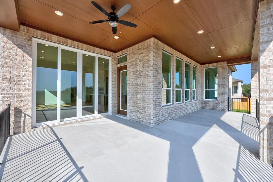 Exterior details and patio area of a home in Parkside On The River, Georgetown (Image 3).