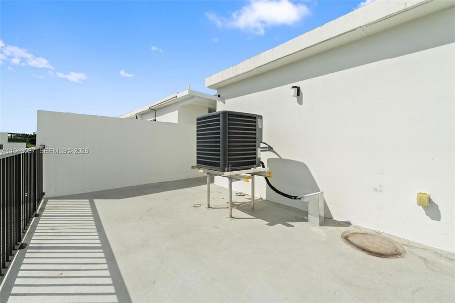Exterior details and patio area of a home in On Grandville, Homestead (Image 21). Exterior details and patio area of a home in On Grandville, Homestead (Image 21).