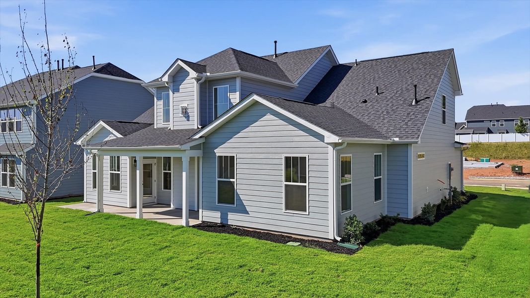 Exterior details and patio area of a home in Kayfield at Midway, Anderson (Image 21).