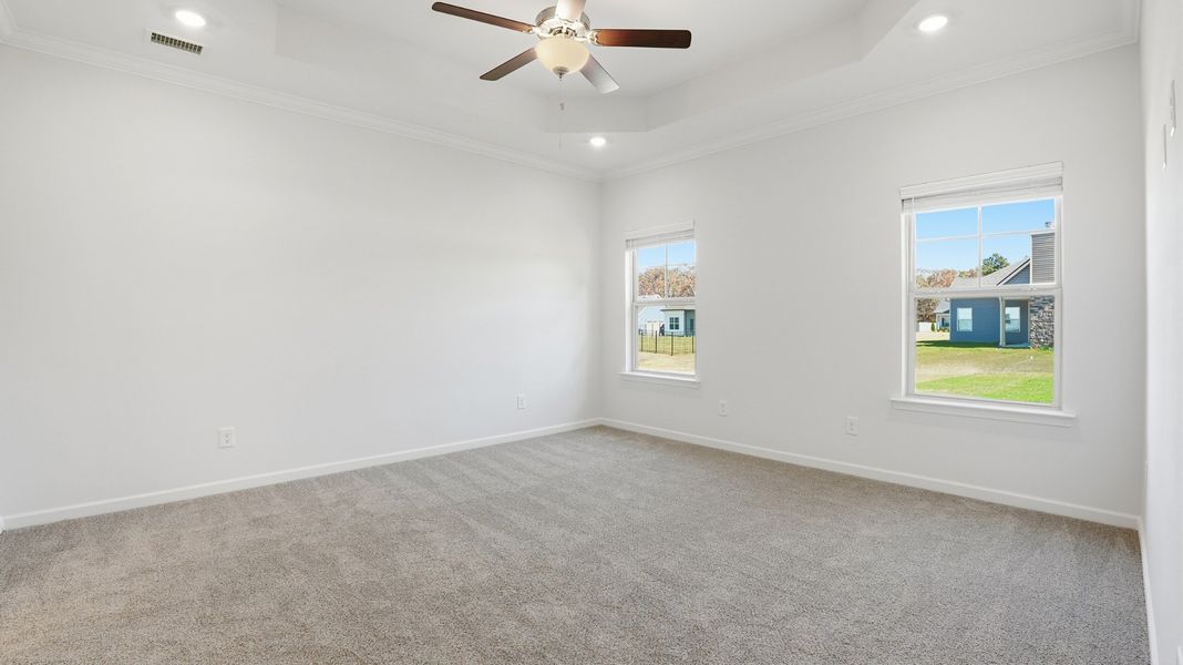 primary bedroom with trey ceiling and led lights in each corner primary bedroom with trey ceiling and led lights in each corner