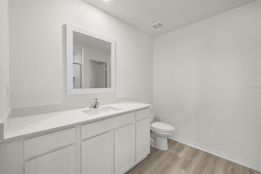 Furnished interior view inside a new home in Tula Parc, Astatula (Image 5).