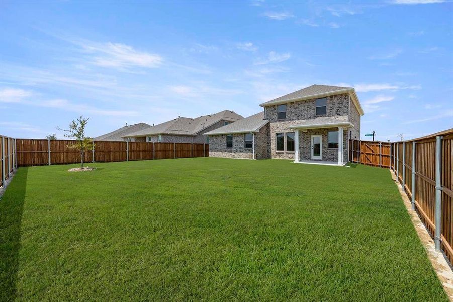 Front exterior of a new home in Brookshire at Legacy Hills-60s, Celina, TX, highlighting curb appeal (Image 2).