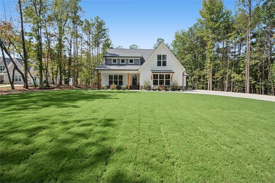Front exterior of a new home in , Douglasville, GA, highlighting curb appeal (Image 29).