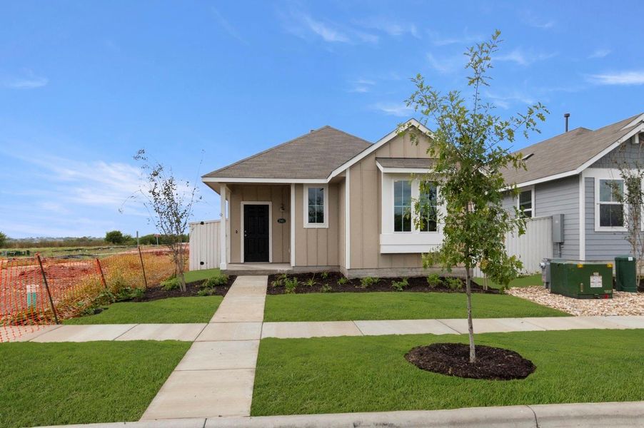 Front exterior of a new home in Casetta Ranch, Kyle, TX, highlighting curb appeal (Image 19).