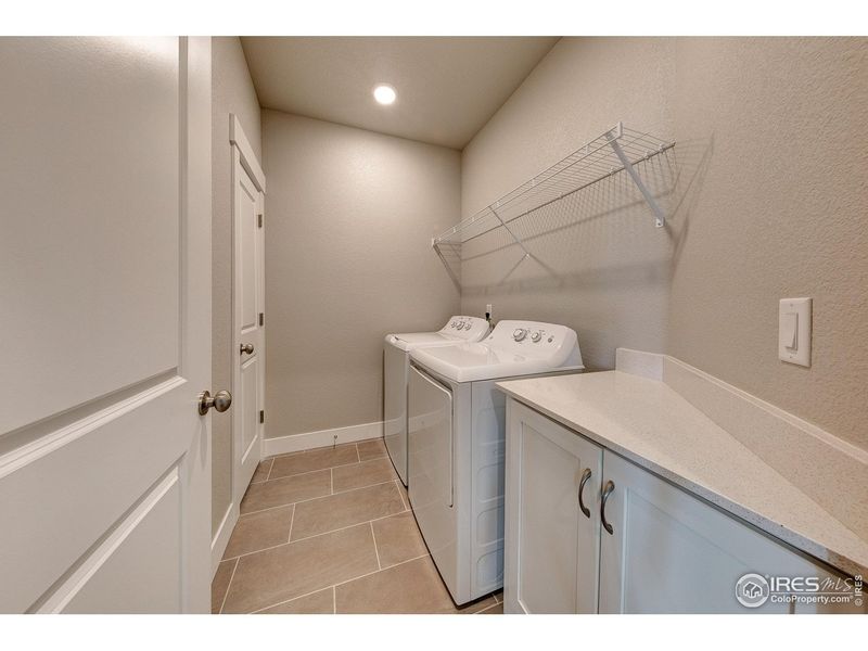 Furnished interior view inside a new home in Highlands at Fox Hill - The Flats, Longmont (Image 5).