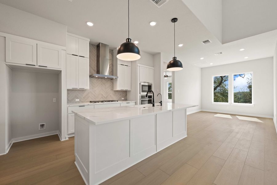 Furnished interior view inside a new home in Wolf Ranch, Georgetown (Image 12).