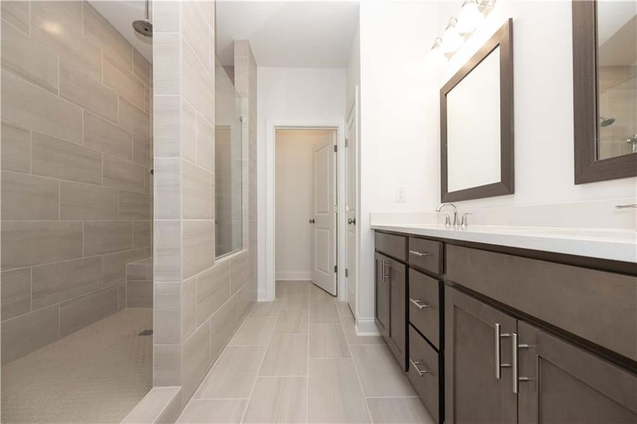 This is an expansive/luxury walk in shower with drying area in the owners bathroom
Pictures represent a previously built home not the actual home This is an expansive/luxury walk in shower with drying area in the owners bathroom
Pictures represent a previously built home not the actual home