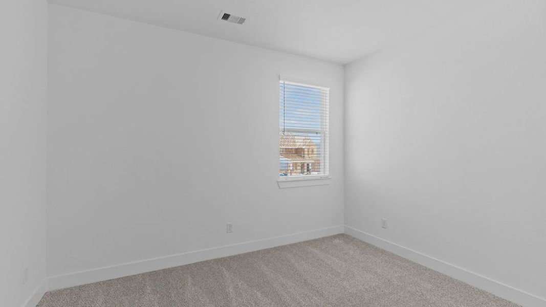 Spacious, unfurnished interior of a new home in Attwater 55s, Waller (Image 26).