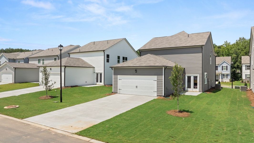 Representative exterior photo of a completed home built from the Baker ll by D.R. Horton in Braselton Village, Braselton, GA (Image 17).