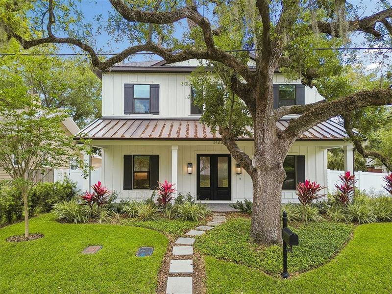 Front exterior of a new home in , Tampa, FL, highlighting curb appeal (Image 30).