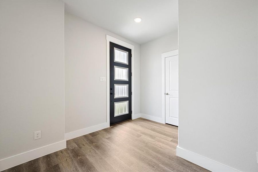 Our Aurora plan features the perfect entry area with oversized coat closet.