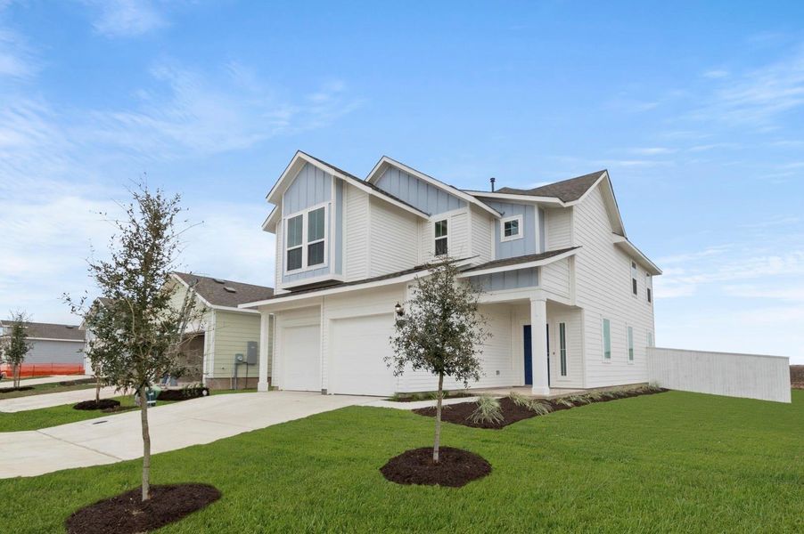 Front exterior of a new home in Harvest Ridge, Elgin, TX, highlighting curb appeal (Image 1).