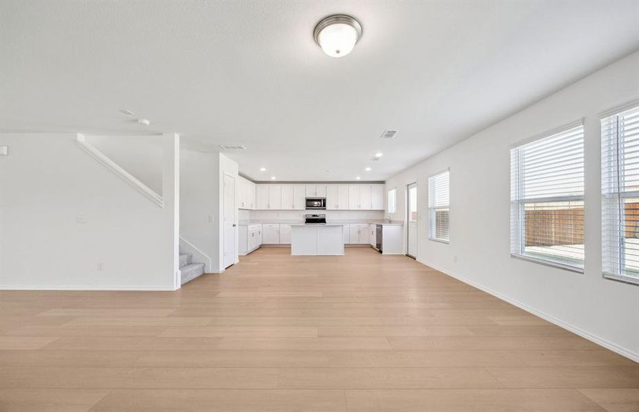 Airy gathering room showcases open concept floorplan Airy gathering room showcases open concept floorplan