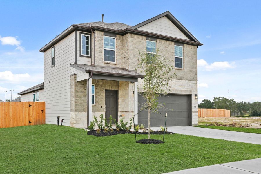 Front exterior of a new home in Valor Park, Bay City, TX, highlighting curb appeal (Image 17).
