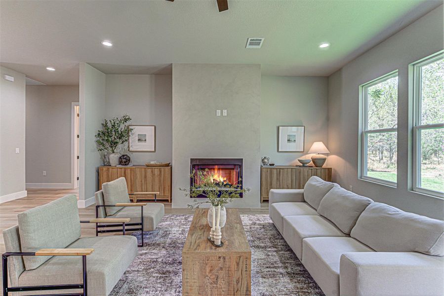Living area featuring a premium fireplace.