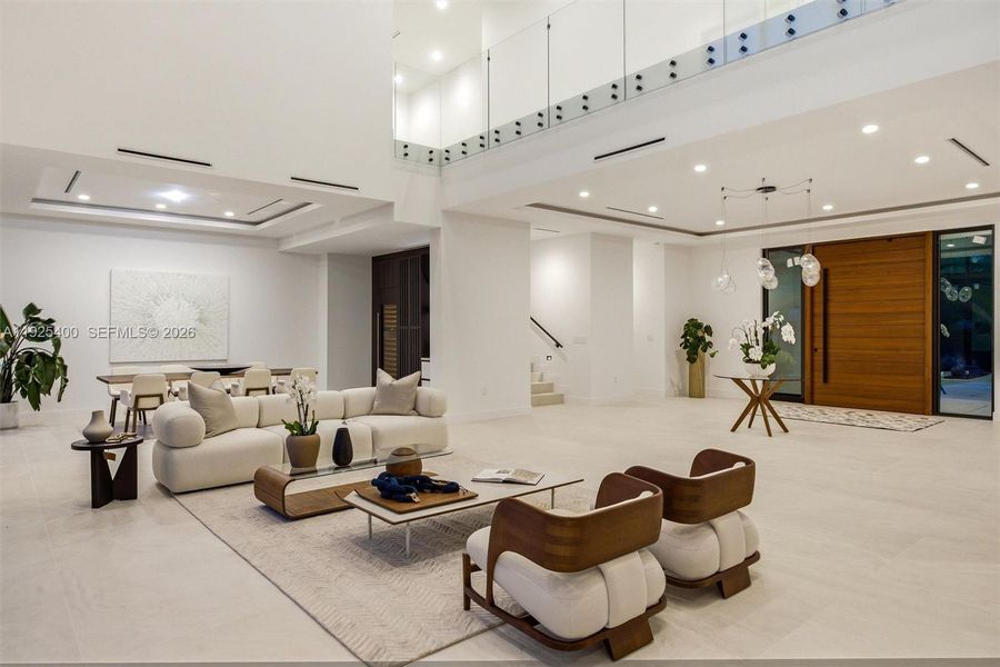 Luxury Living Room | Double-Height Ceiling | Glass Balcony | Pivot Entry Door Luxury Living Room | Double-Height Ceiling | Glass Balcony | Pivot Entry Door
