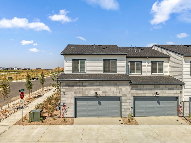 Representative exterior photo of a completed home built from the 2403 by Risewell Homes in Harvest Crossing, Aurora, CO (Image 20).