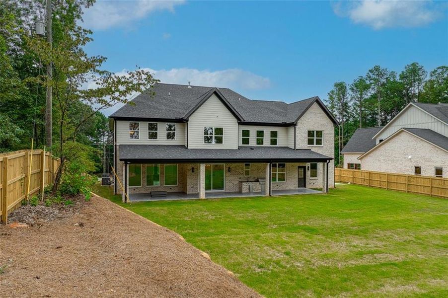 Front exterior of a new home in , Dacula, GA, highlighting curb appeal (Image 24).
