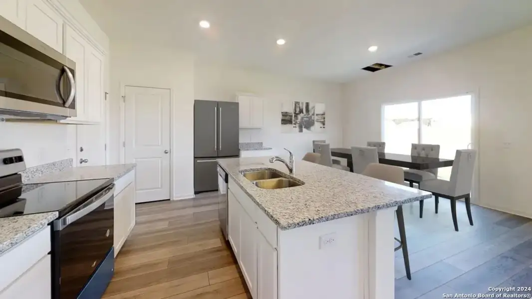 Furnished interior view inside a new home in Trails at Culebra, San Antonio (Image 4).