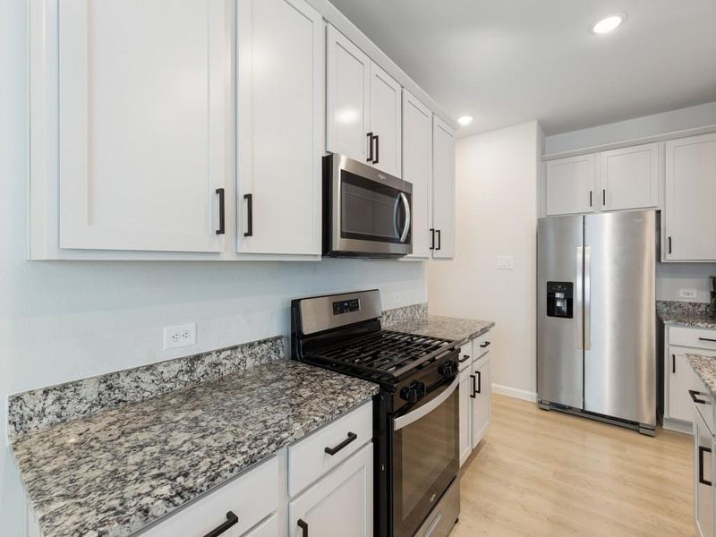 Furnished interior view inside a new home in , Conroe (Image 8).