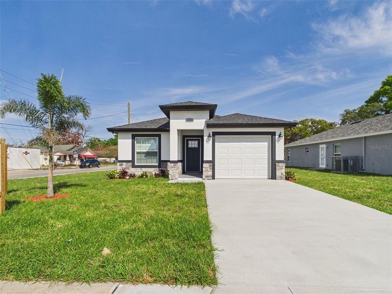 Front exterior of a new home in , Lakeland, FL, highlighting curb appeal (Image 21). Front exterior of a new home in , Lakeland, FL, highlighting curb appeal (Image 21).