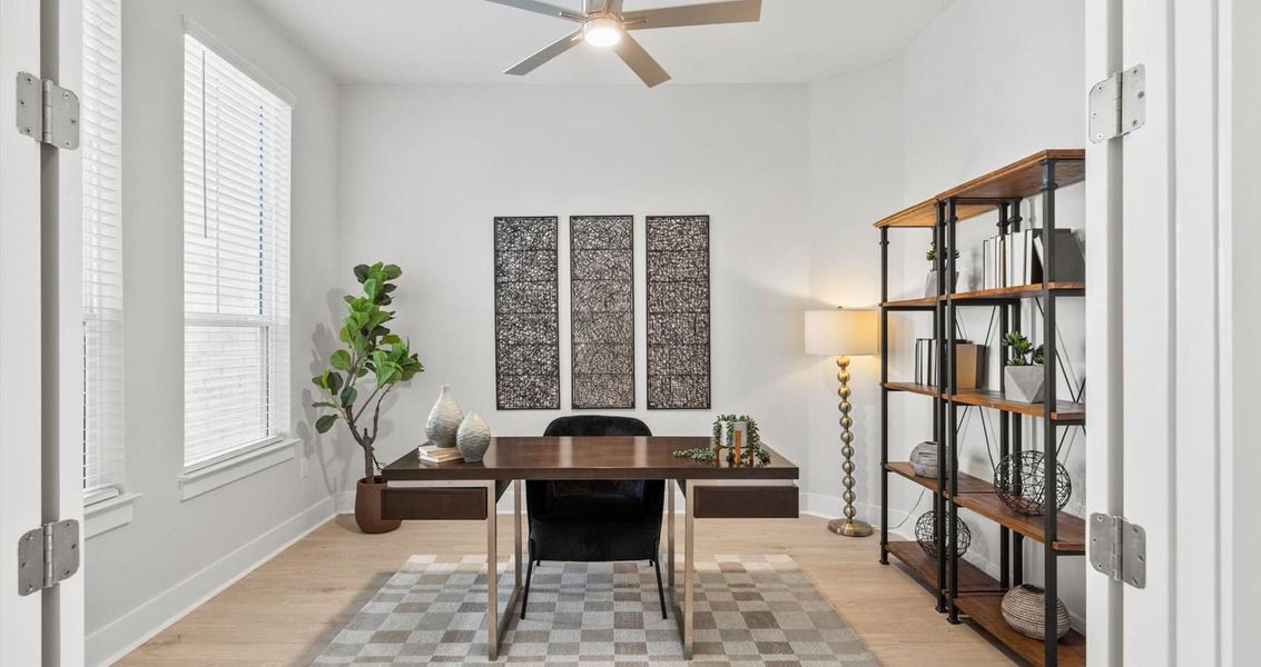 Representative furnished interior of a home built from the Draco by Chesmar Homes in The Grove at Blackhawk, Pflugerville (Image 4).