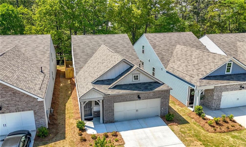 Front exterior of a new home in , Acworth, GA, highlighting curb appeal (Image 1).