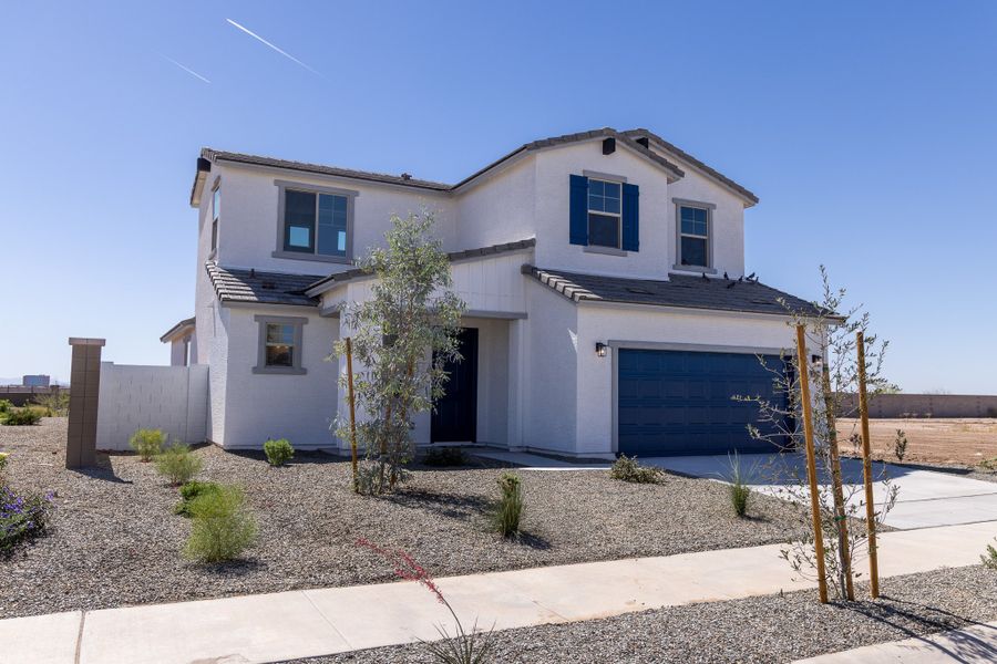 Front exterior of a new home in Rancho Santa Rosa, Maricopa, AZ, highlighting curb appeal (Image 2).