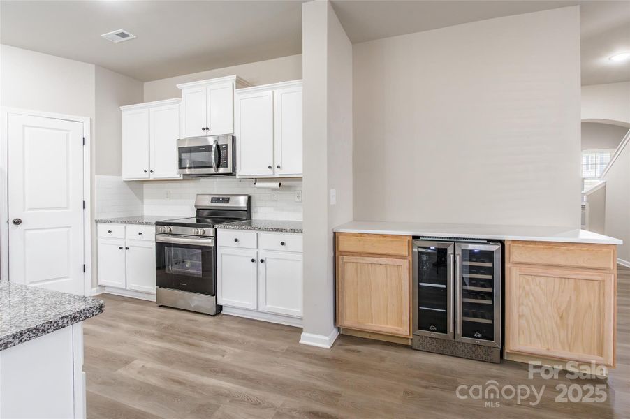 Furnished interior view inside a new home in McGee Place, Charlotte (Image 15).
