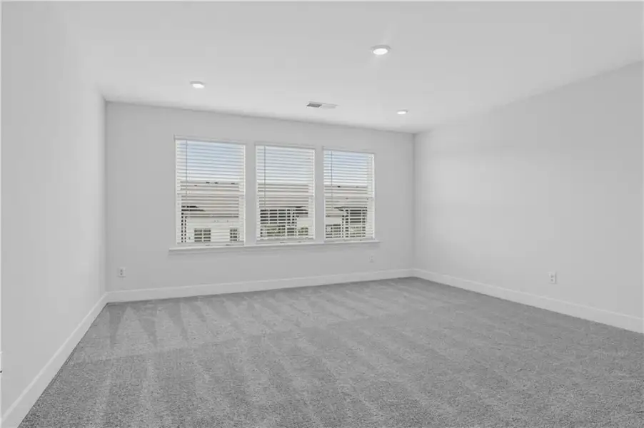 Spacious, unfurnished interior of a new home in Towns at Holly Springs, Holly Springs (Image 26). Spacious, unfurnished interior of a new home in Towns at Holly Springs, Holly Springs (Image 26).