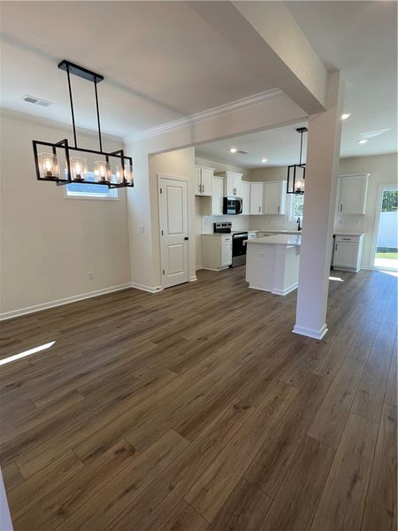 Spacious, unfurnished interior of a new home in Springwood Grove, Central (Image 11).