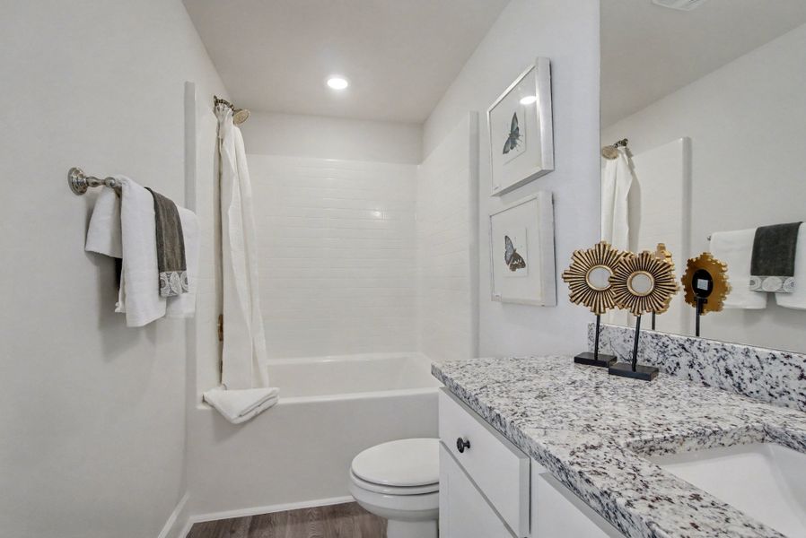 Representative furnished interior of a home built from the Plan 1250 by Adams Homes in Turtle Creek, Cantonment (Image 12).