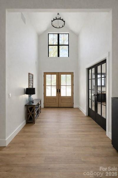 Foyer: 2-story! opens to office on left as you enter the home. Photo is representative of a very similar build. Foyer: 2-story! opens to office on left as you enter the home. Photo is representative of a very similar build.