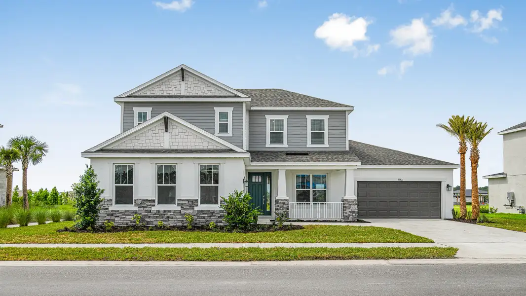Representative exterior photo of a completed home built from the Anna Marie by Taylor Morrison in Hammock at Two Rivers, Zephyrhills, FL (Image 19).