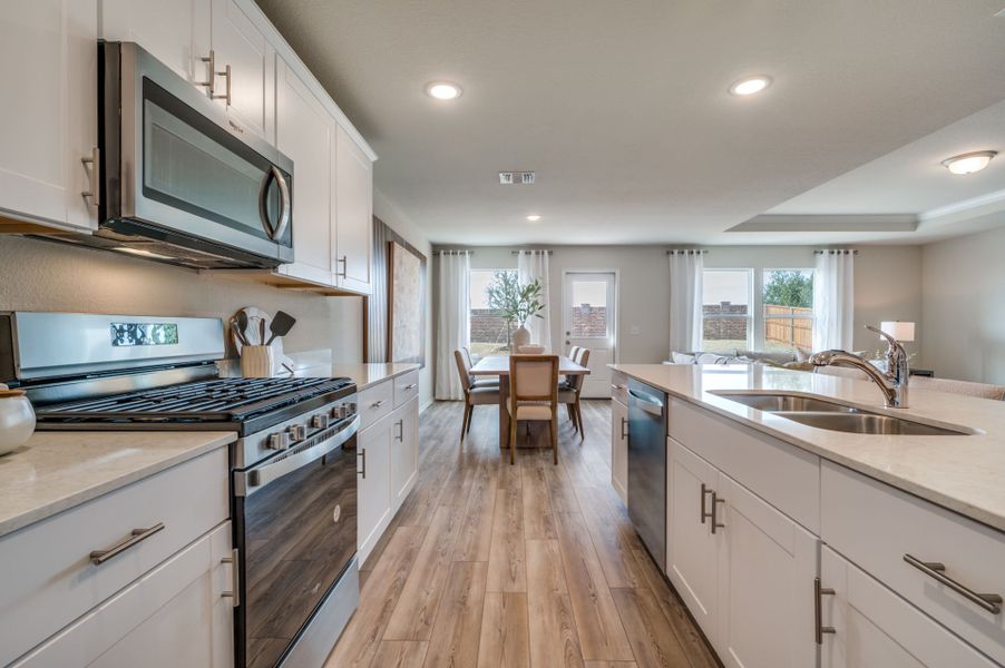 Representative furnished interior of a home built from the Stockdale by Centex in Mobberly Farms, Pilot Point (Image 6).
