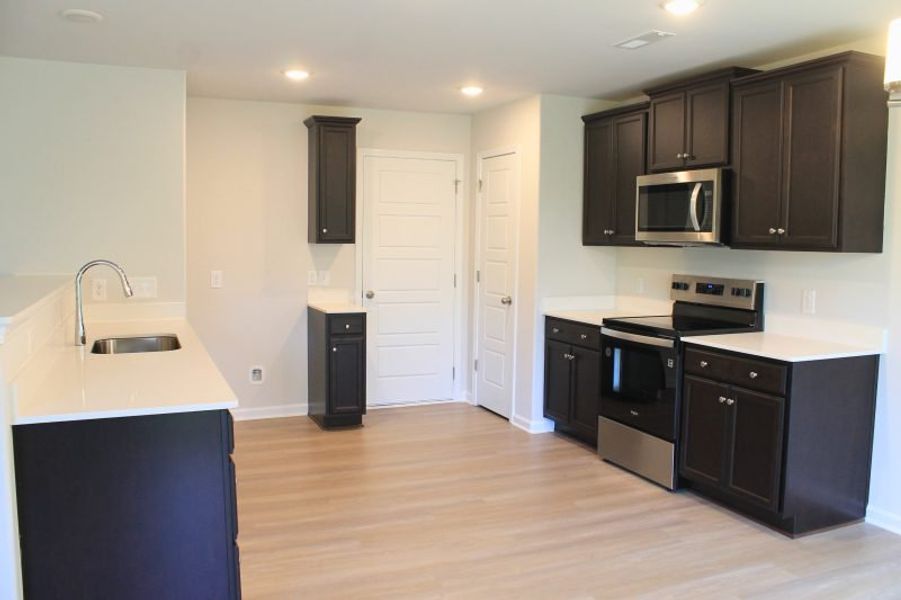 Furnished interior view inside a new home in The Wilcox, Greensboro (Image 5).